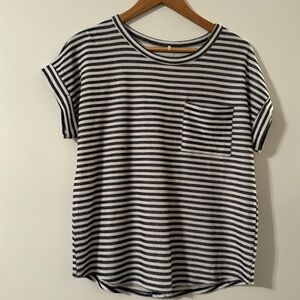 gray, and white top with front pocket and accent buttons on the back size small